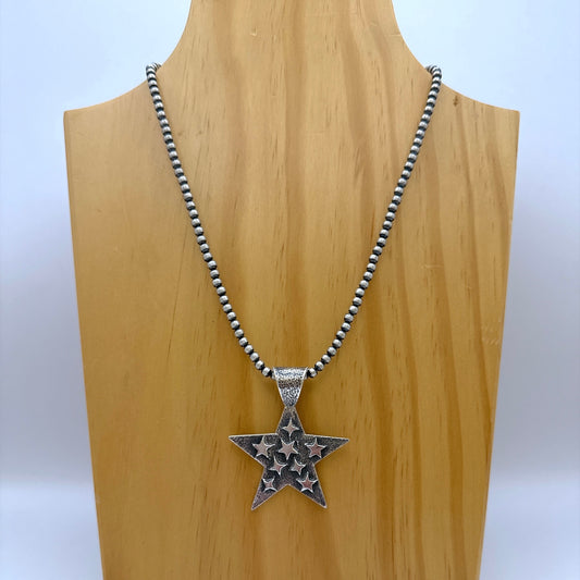 トゥファキャストスターペンダントトップ By Kevin Yazzie