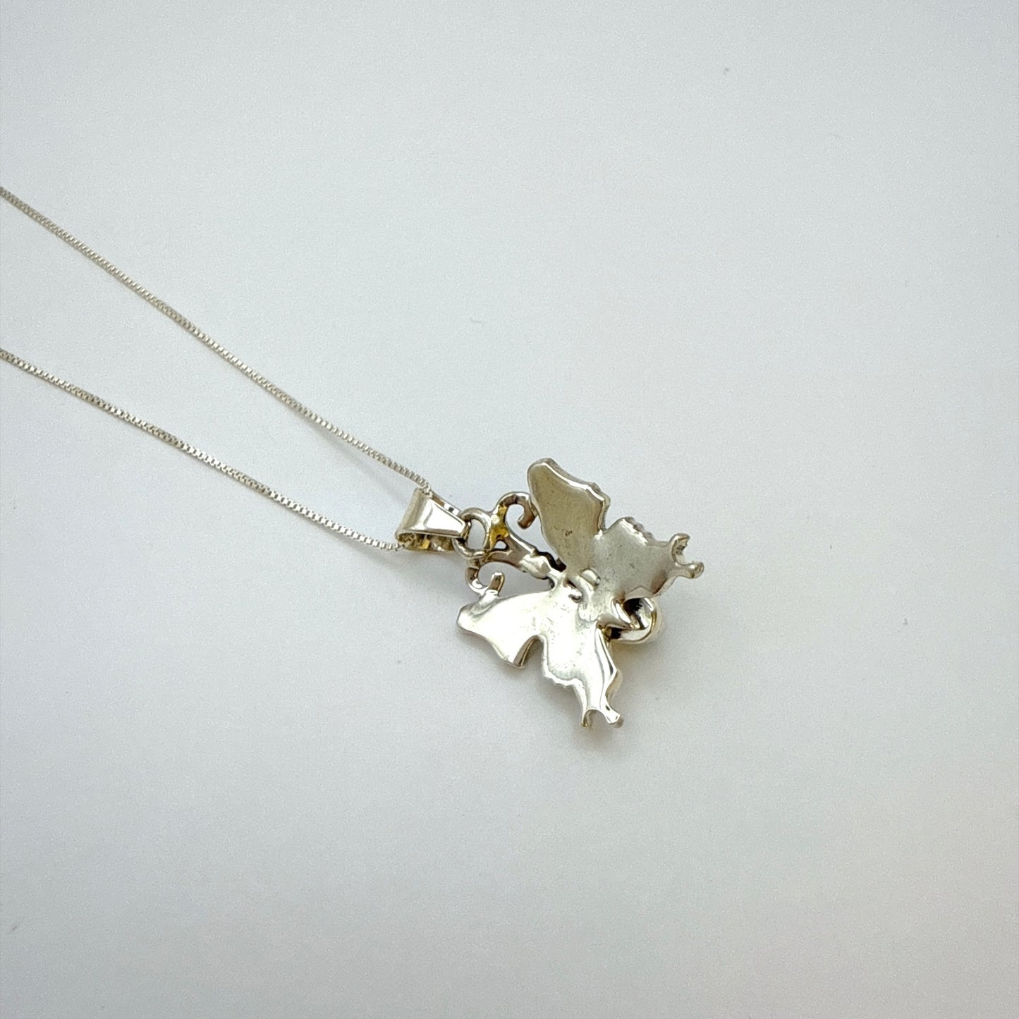 バタフライクラウドマウンテンターコイズペンダントネックレス