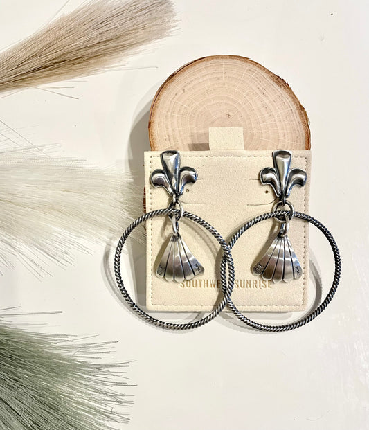 Twisted Hoop Earrings By Derrick Cadman