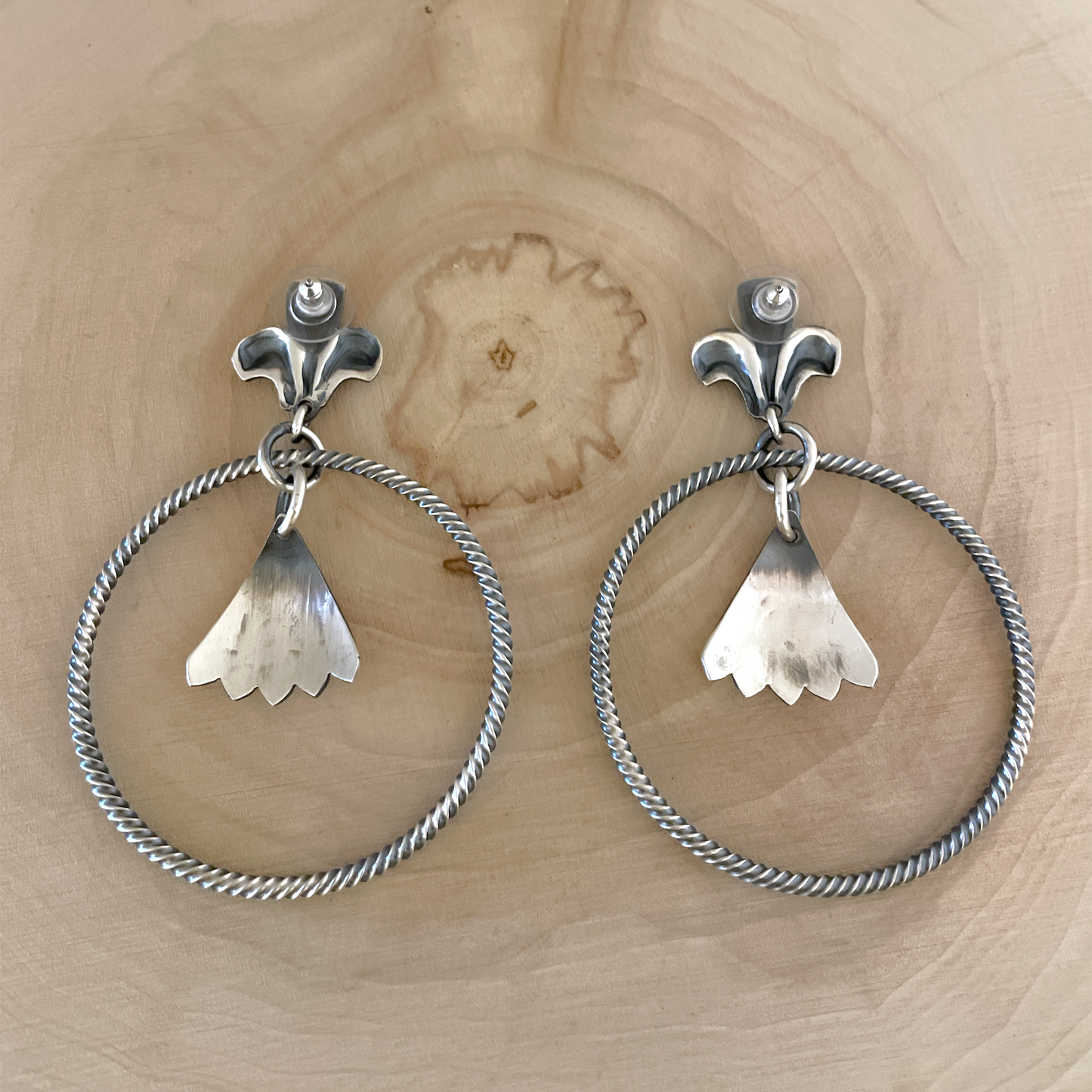 Twisted Hoop Earrings By Derrick Cadman