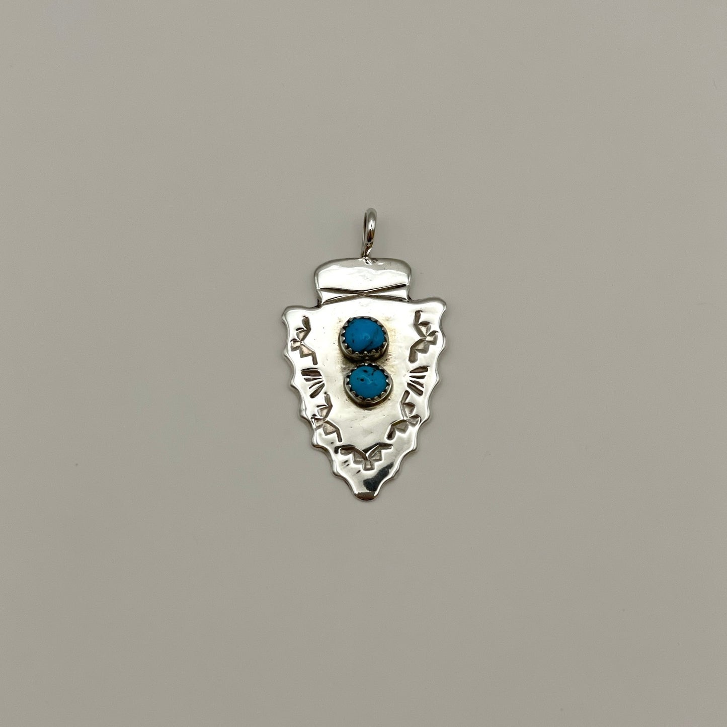 Stamped Sterling Silver Arrowhead Pendant with Sleeping Beauty Turquoise