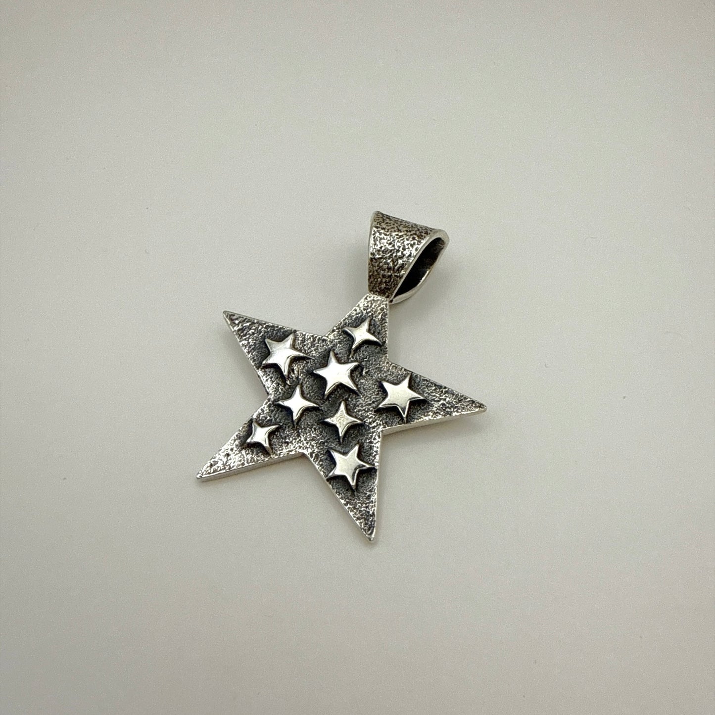 Tufa Cast Star Pendant By Kevin Yazzie