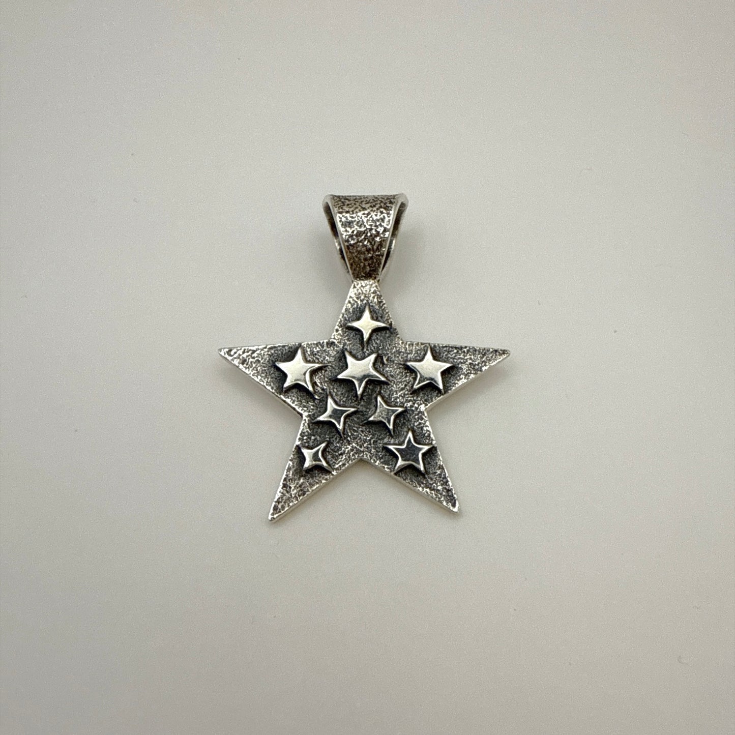 Tufa Cast Star Pendant By Kevin Yazzie