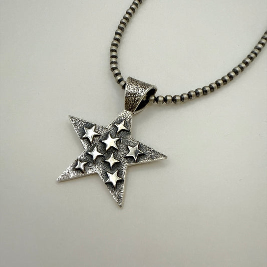 Tufa Cast Star Pendant By Kevin Yazzie