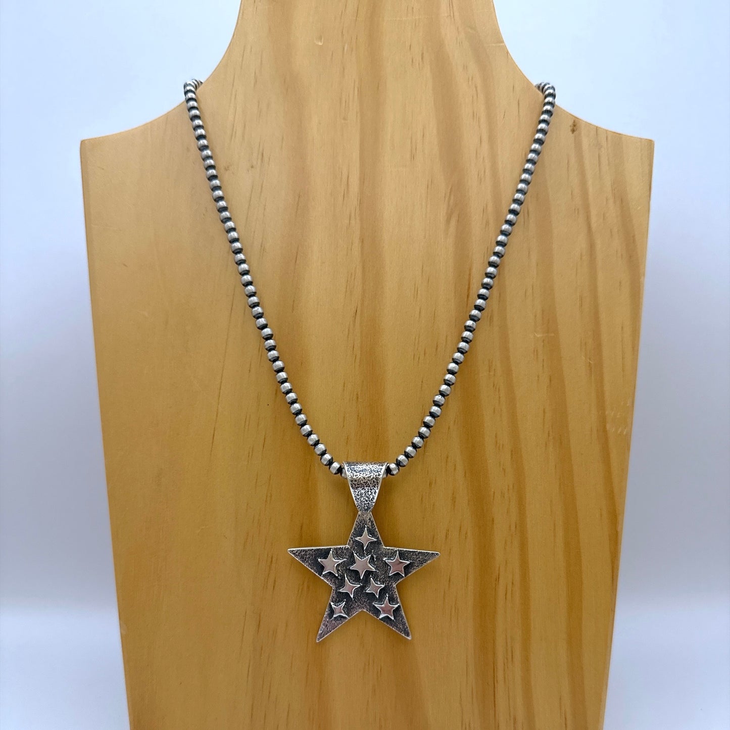 Tufa Cast Star Pendant By Kevin Yazzie