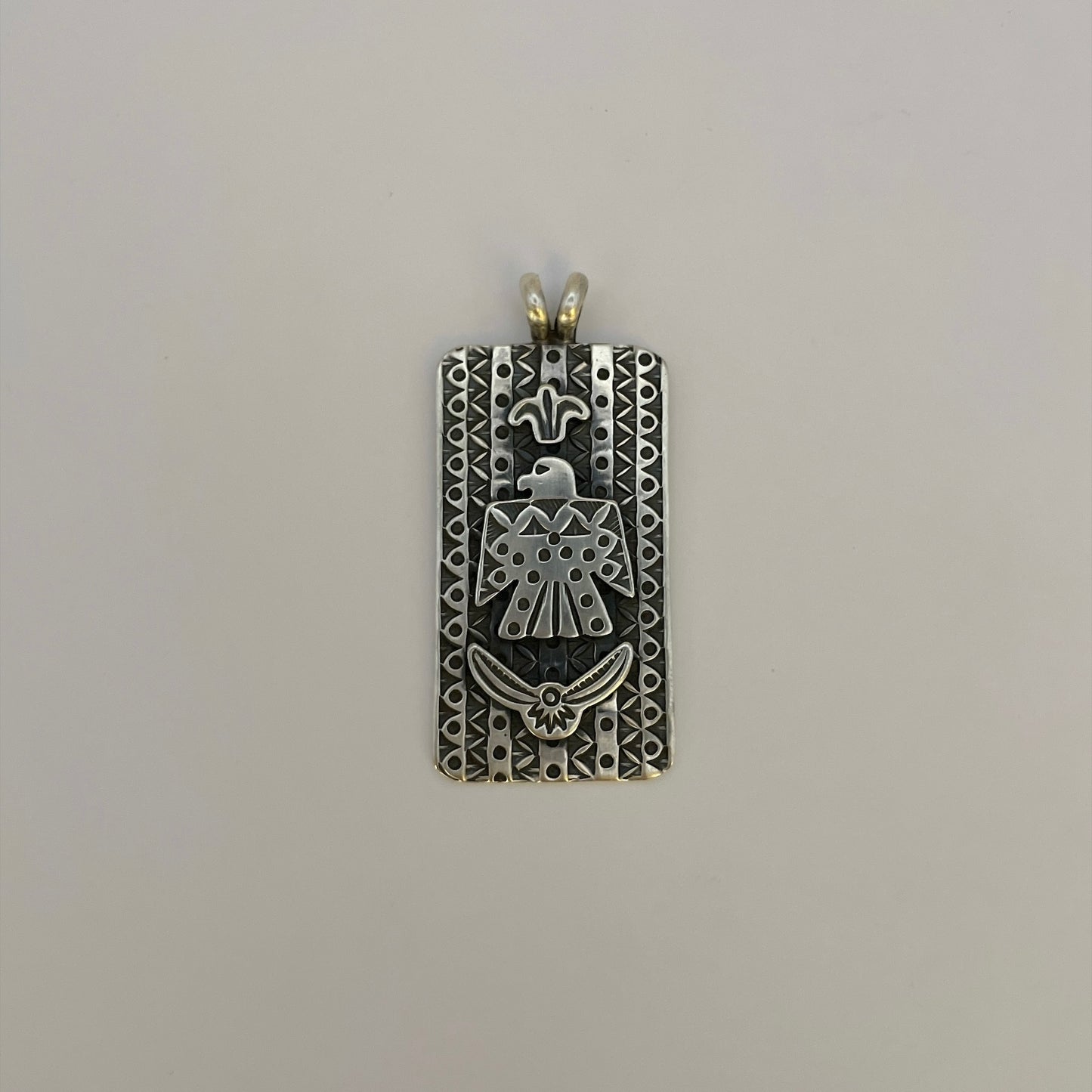 Stamped Thunderbird Bar Pendant By Bo Reeves