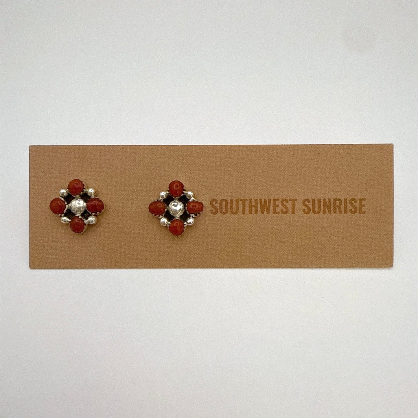 Four Coral Stud Earrings