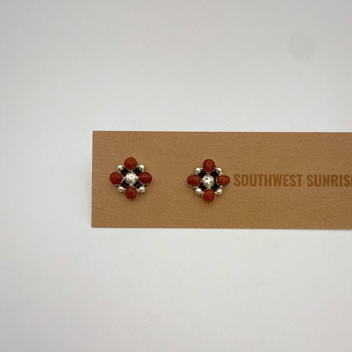 Four Coral Stud Earrings