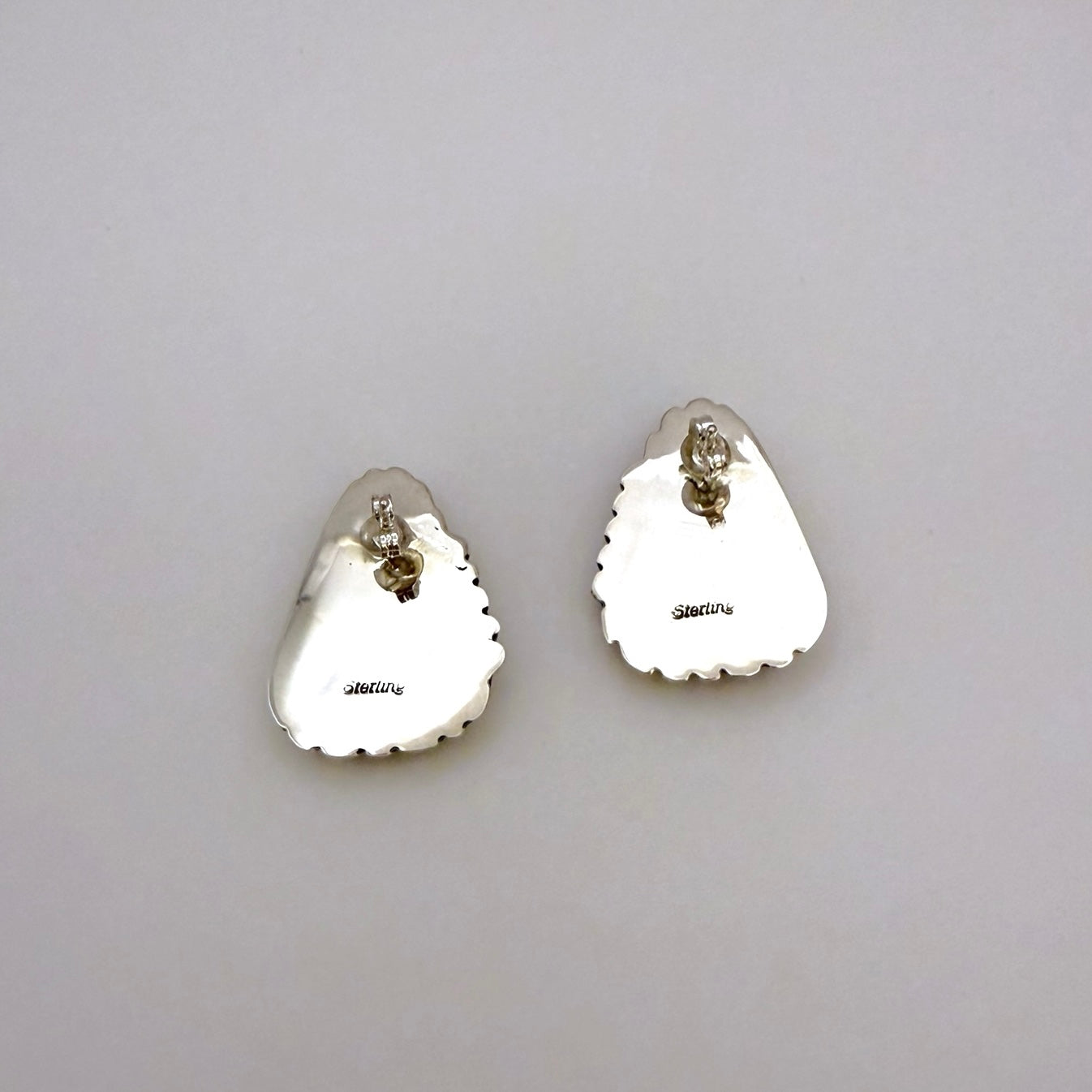 White Buffalo Stud Earrings