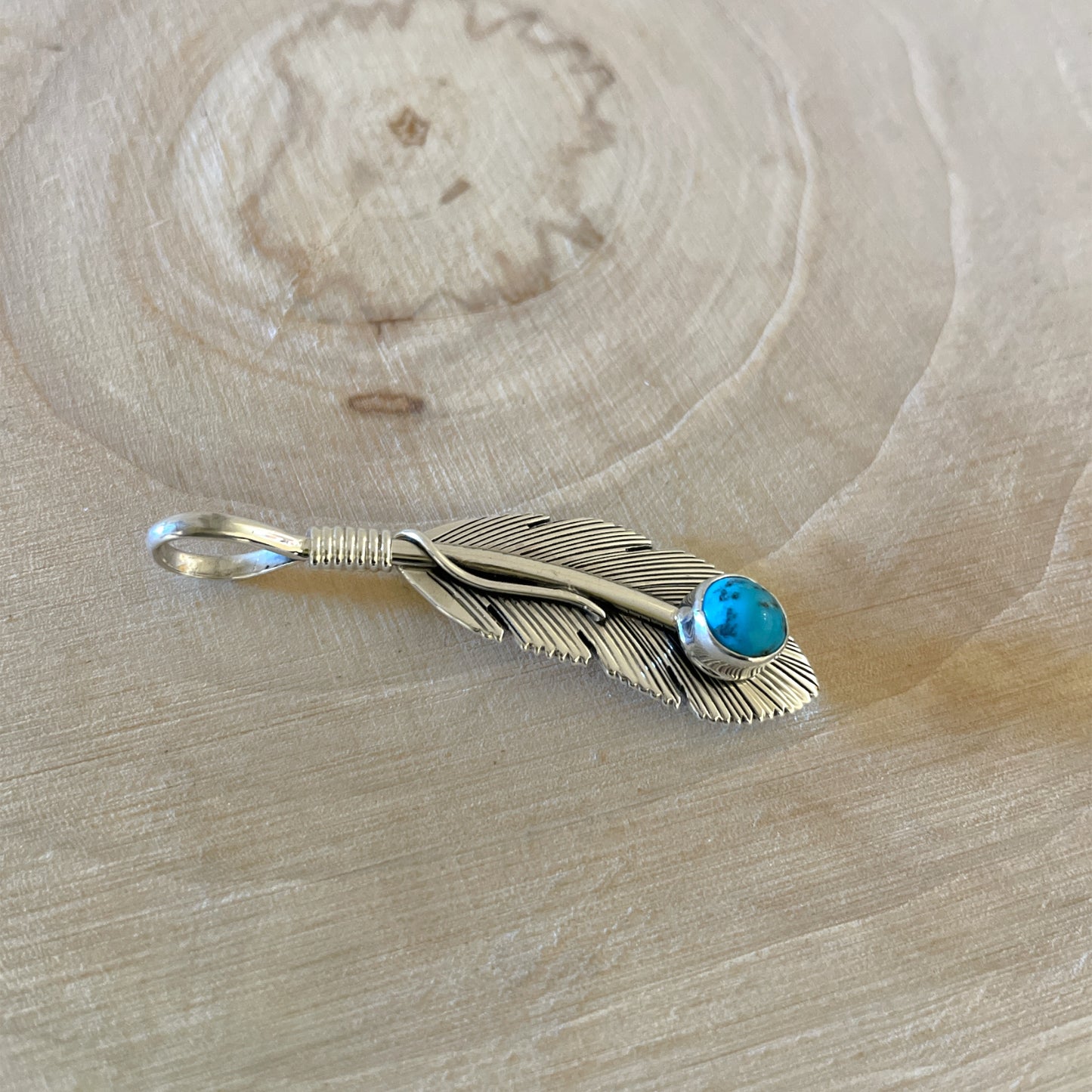 Sterling Silver Turquoise Feather Pendant By Harvey Mace