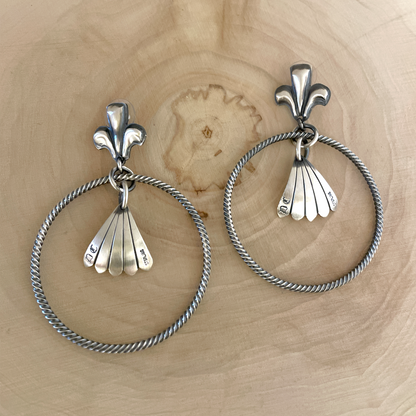 Twisted Hoop Earrings By Derrick Cadman