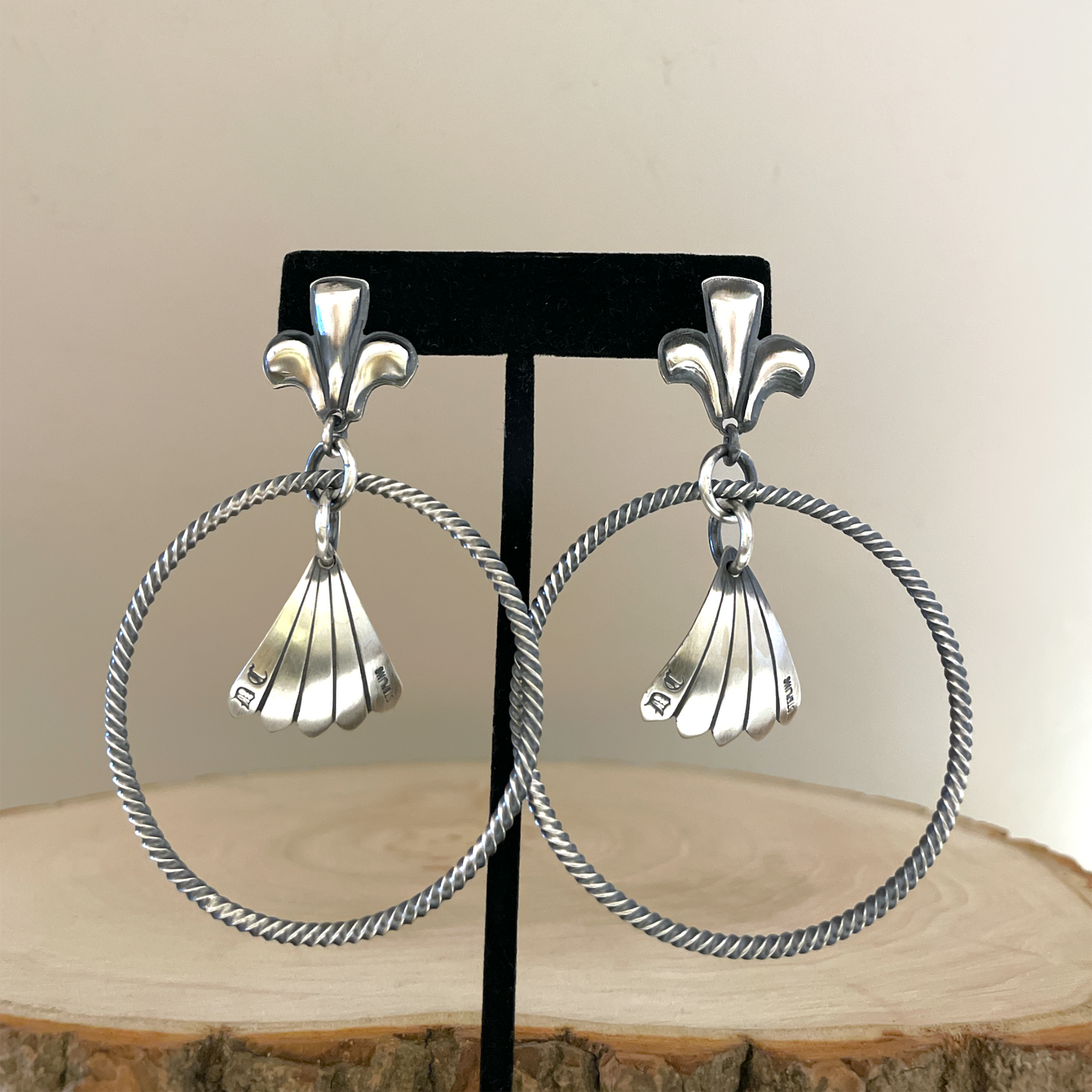 Twisted Hoop Earrings By Derrick Cadman