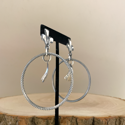 Twisted Hoop Earrings By Derrick Cadman